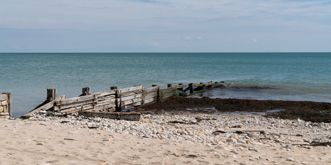 Beautiful Seascape Breakwater in Sea near Coastline