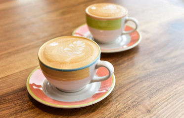 Two cups of cappuccino.
