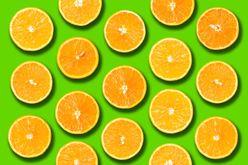 Background of half cut organic oranges