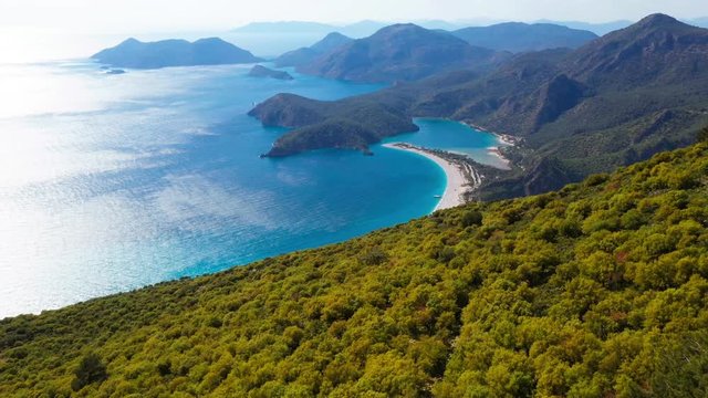 Oludeniz is a resort village on the southwest coast of Turkey. It&rsquo;s known for the blue lagoon of Oludeniz Tabiat Parki and the wide, white Belcekiz Beach.
