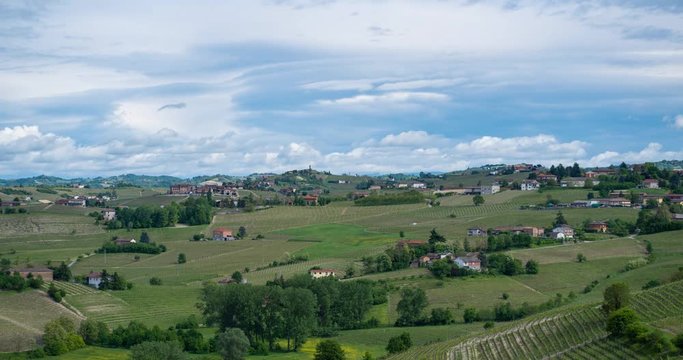 time lapse of landscape of beautiful green hills of vineyards of Tuscany and Piedmont, Italy. Region wine area langhe, monferrato and roero fields famous for wine tasting in winery.