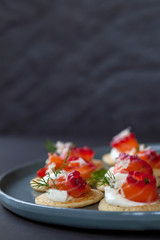 Party blinis with beetroot cured salmon, cream and horseradish 