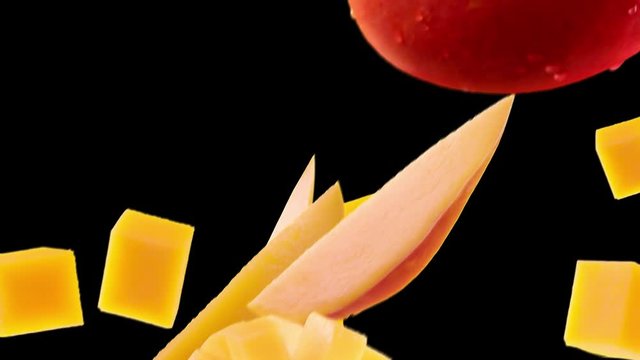 Mango with Slices Falling on Black Background