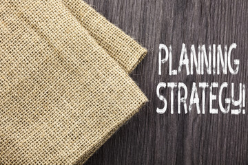 Conceptual hand writing showing Planning Strategy. Concept meaning systematic process of...