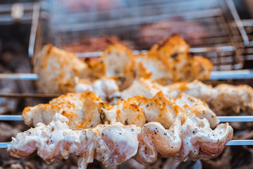 Juicy meat barbecue on a hot brazier