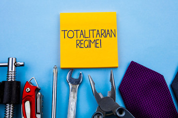 Conceptual hand writing showing Totalitarian Regime. Concept meaning mode of government that...