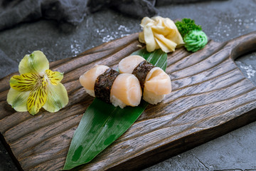 sushi scallop on a board