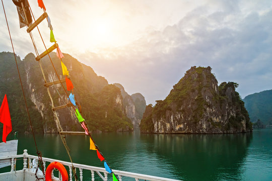 Summer vacation Vietnam, Ha Long Bay Cruse liner junk sails in sea landscape travel