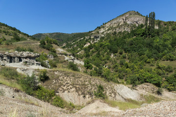 Fototapeta na wymiar Summer landscape of Rock formation The Stone Dolls of Kuklica near town of Kratovo, Republic of North Macedonia
