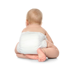 Cute little baby crawling on white background