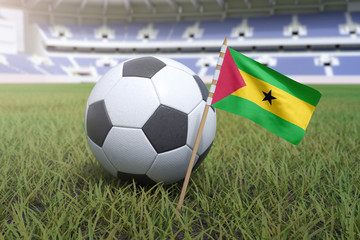 Sao Tome and Principe flag in stadium field with soccer football