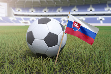 Slovakia flag in stadium field with soccer football