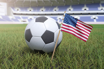 Fototapeta premium American flag in stadium field with soccer football