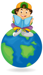 Boy reading book on earth