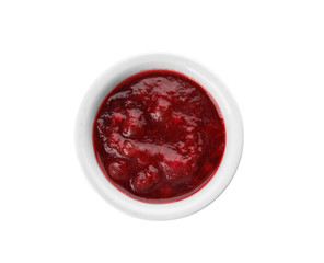 Bowl of cranberry sauce on white background, top view