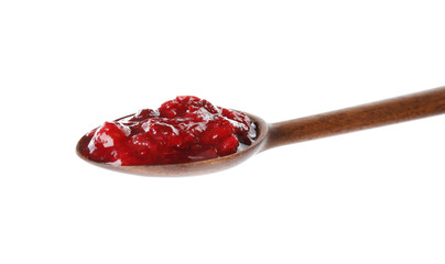 Spoon with cranberry sauce on white background
