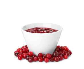 Bowl of cranberry sauce on white background