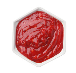 Bowl with red sauce isolated on white, top view