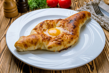 ajara Khachapuri on white plate georgian kitchen