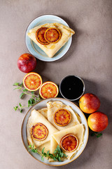 Homemade pancakes with blood oranges