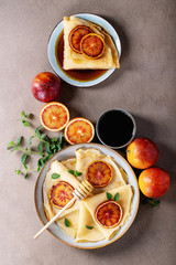 Homemade pancakes with blood oranges