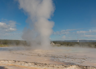 Wide View of Steam Rising from Geyser