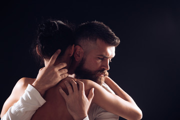 Connecting on a passionate level. Sensual couple in love. Couple of bearded man and sexy woman. Family couple hugging with tenderness. Erotic couple enjoying sexual experience, copy space