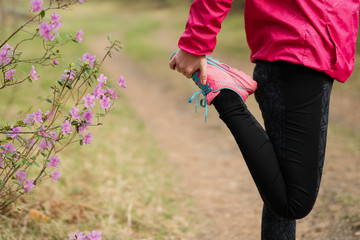 Adult woman doing workout in the park.