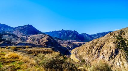 View of the Fraser River along Highway 99, from the area called the 10 mile slide or Fountain Slide, as the river flows to the town of Lillooet in the Chilcotin region on British Columbia, Canada