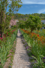 Obraz premium Giverny, France - 05 07 2019: The gardens of Claude Monet in Giverny. The garden near the house