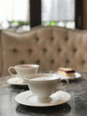 Coffee cup on table in coffee shop