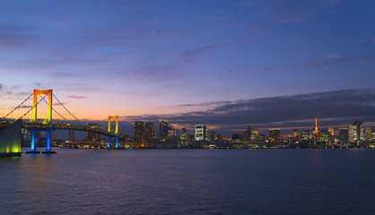 Fototapeta na wymiar 東京夜景 虹色のレインボーブリッジと東京タワー