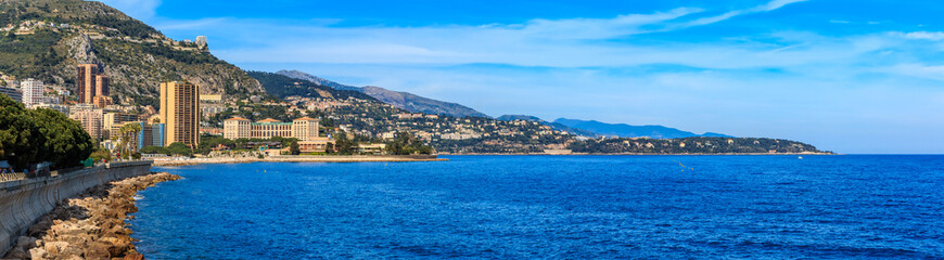 Fototapeta na wymiar Panorama of Monaco coastline and luxury residential apartment buildings in Monte Carlo Principality of Monaco