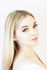 Fototapeta premium The girl's face is a blonde. Close-up. Facial care
