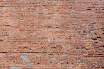 old red brick wall,shot on a Sunny spring day