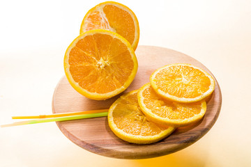 oranges sliced on the table isolated on white background