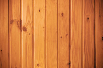 Natural color wooden siding panel background.