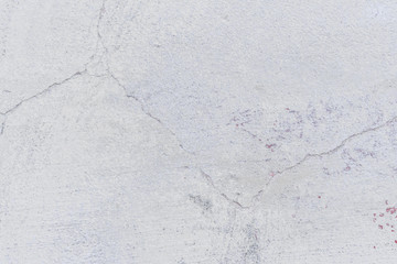 Texture, wall, concrete, it can be used as a background. Wall fragment with scratches and cracks