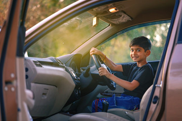 Cute Indian child in car