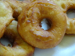 donuts with powdered sugar on plate