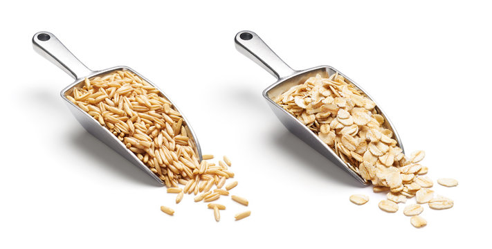 Oat Groats And Rolled Oats On Metal Scoop