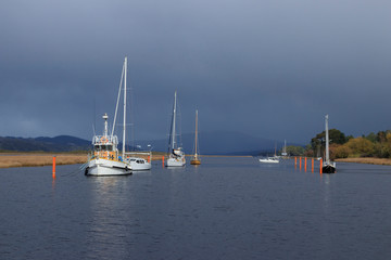 Fototapeta premium Boats moored on Huon River at Franklin Tasmania