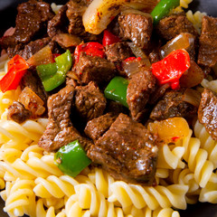 Fussili noodle with klaschise spicy goulash and paprika