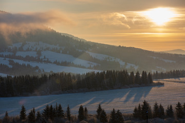 beautiful sunrise in winter in the mountains