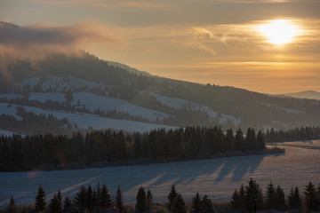 beautiful sunrise in winter in the mountains