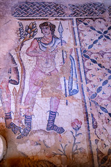 Obraz na płótnie Canvas Fragment of an ancient floor mosaic in Zippori National Park, Israel. Ancient city Zippori with ruins and mosaics is a famous tourist spot
