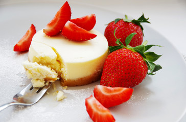 Delicious classic cheesecake. Cheesecake with fresh strawberries.