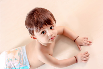 Obraz na płótnie Canvas Cute Indian Baby Boy in diaper