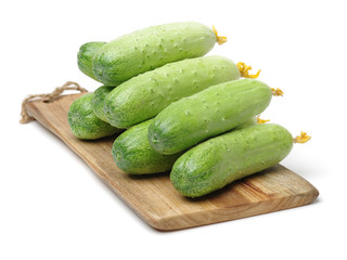 Green cucumber on the white background
