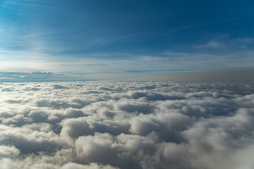 Fototapeta na wymiar Blue sky with low level cloud layer